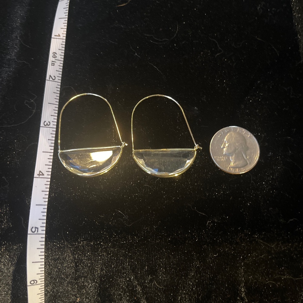 Clear and gold tone earrings